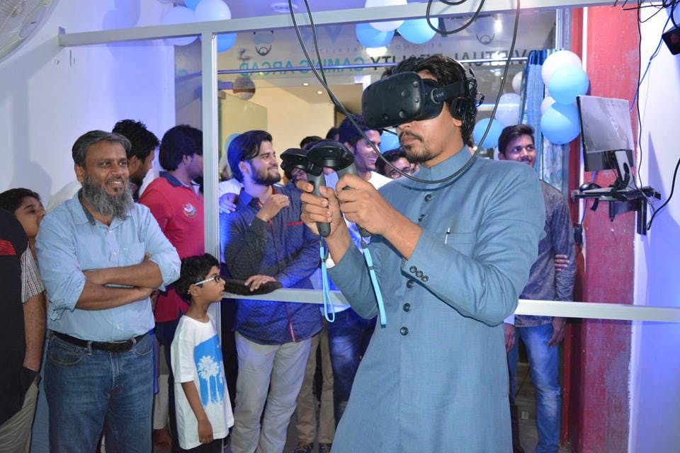 Demonstrating a virtual reality headset at a public event